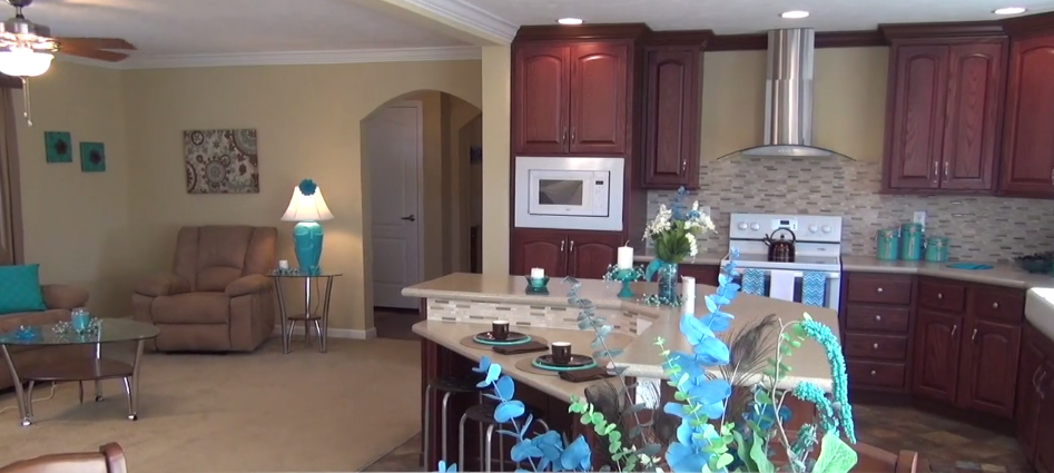 living-room-kitchen-umh-homes-model-MH-village-manufactured-home-living-news-2